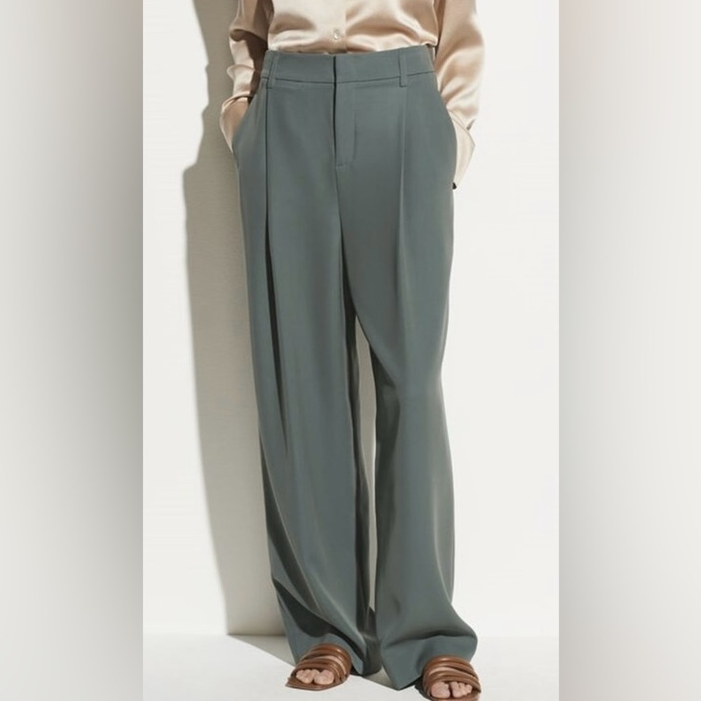 Vince dark sage colored mid-rise pleated front wide leg trousers.